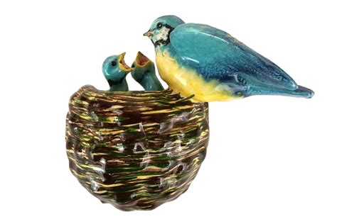 figurines ceramic birds|ceramic bird figurine with nest.